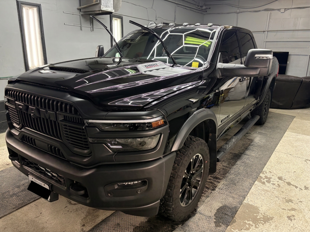 Ram 2500 front three-quarter, glossy after detail