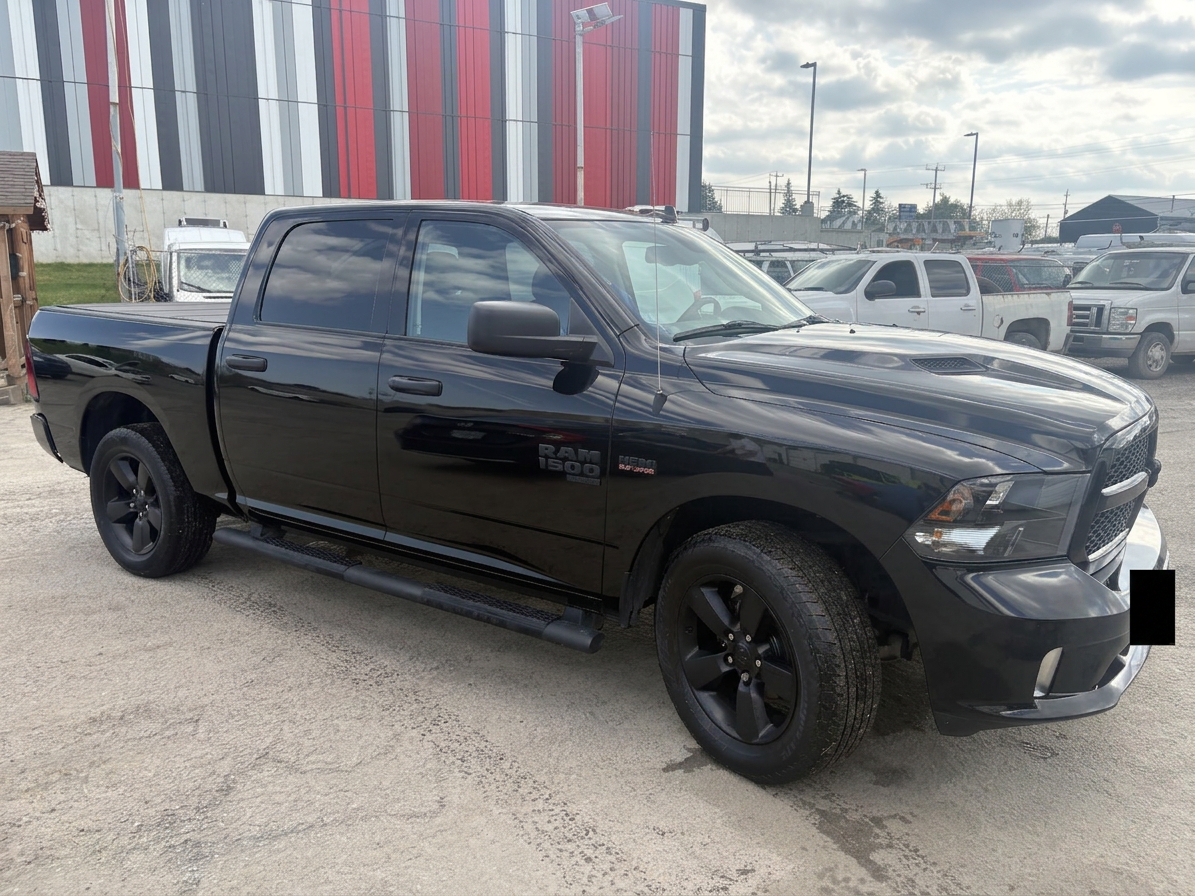 Black Ram 1500 outdoors after wash and wax